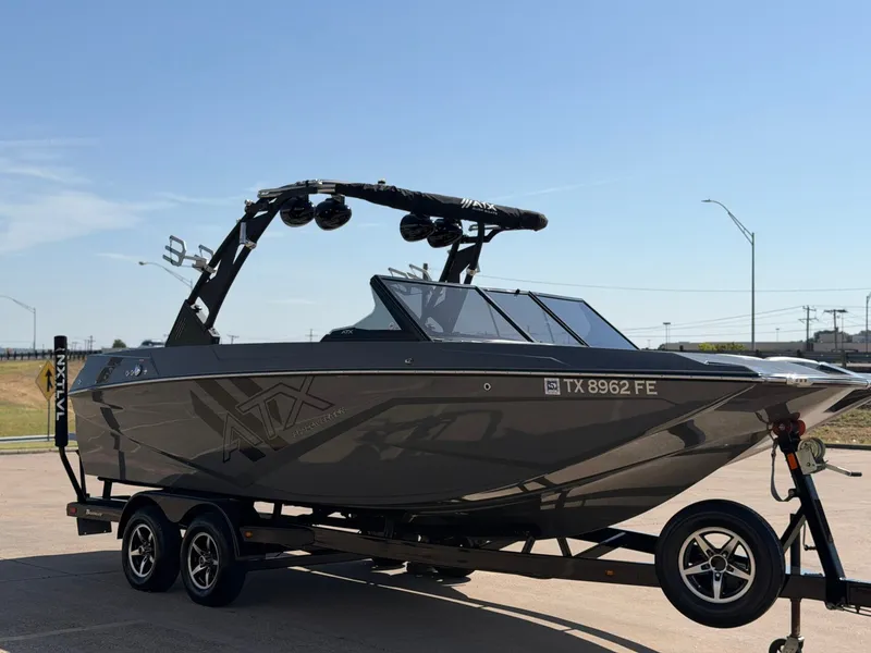 Slide: The Image of A gray ATX Surf Boat, 2020 model 22 Type-S, is on a trailer. - 6