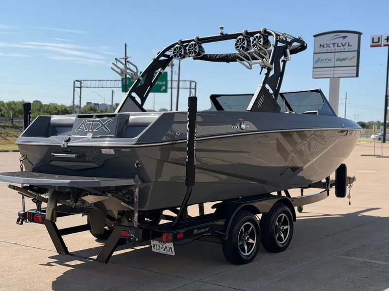 Slide: The Image of A gray ATX Surf Boat, 2020 model 22 Type-S, is on a trailer. - 5