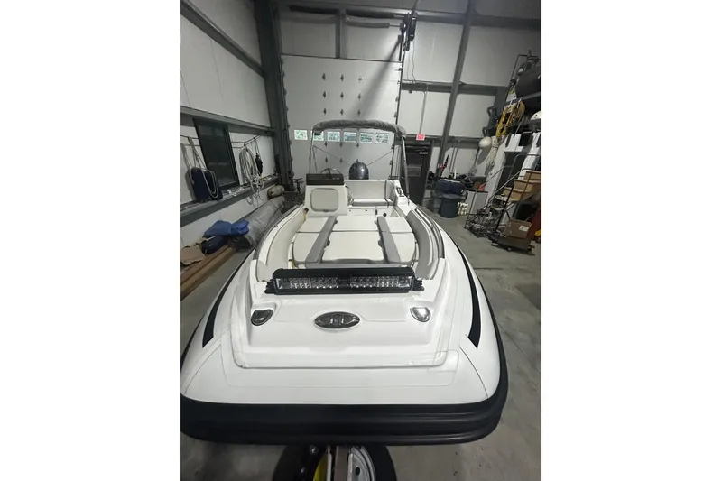 Slide: The Image of 2022 AB Inflatables Nautilus 17 DLX boat in a storage facility. - 18