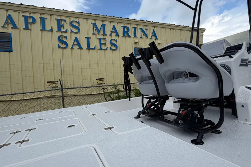 Slide: The Image of 2022 SCB S22 boat at Naples Marina Sales, featuring sleek seating and modern design. - 12