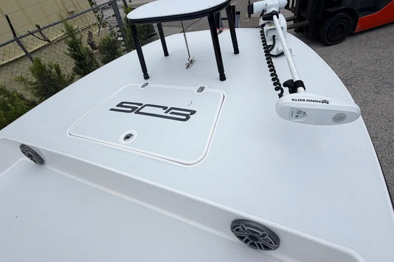 Slide: The Image of 2022 SCB S22 boat deck with Minn Kota trolling motor and speakers. - 17
