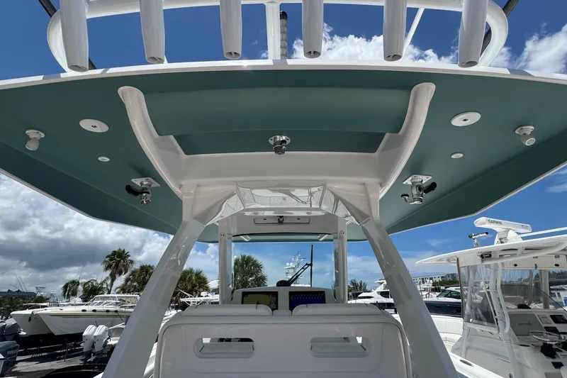 Slide: The Image of 2025 Intrepid 375 Nomad SE boat helm with modern design and advanced features. - 15