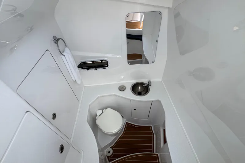 Slide: The Image of Modern bathroom interior of 2025 Intrepid 375 Nomad SE boat with sink and toilet. - 12