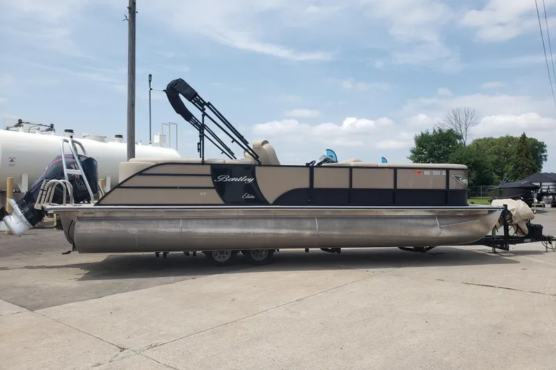 The Image of 2023 Bentley Pontoons Elite 253 Admiral pontoon boat parked outdoors. - 1