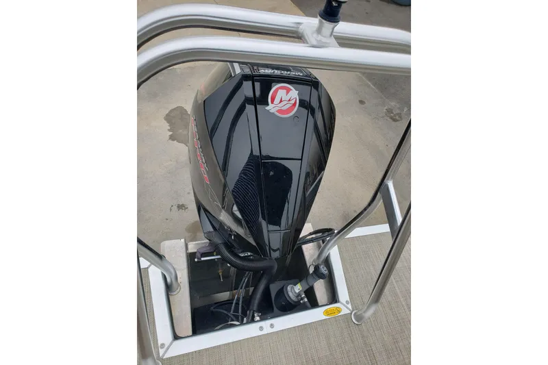 Slide: The Image of 2023 Bentley Pontoons Elite 253 Admiral outboard motor, docked on a pontoon boat. - 12