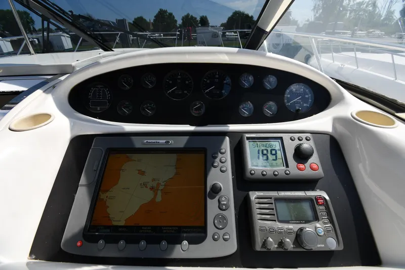 Slide: The Image of Control panel of a 1997 Sunseeker Camargue 51 yacht with navigation instruments. - 14