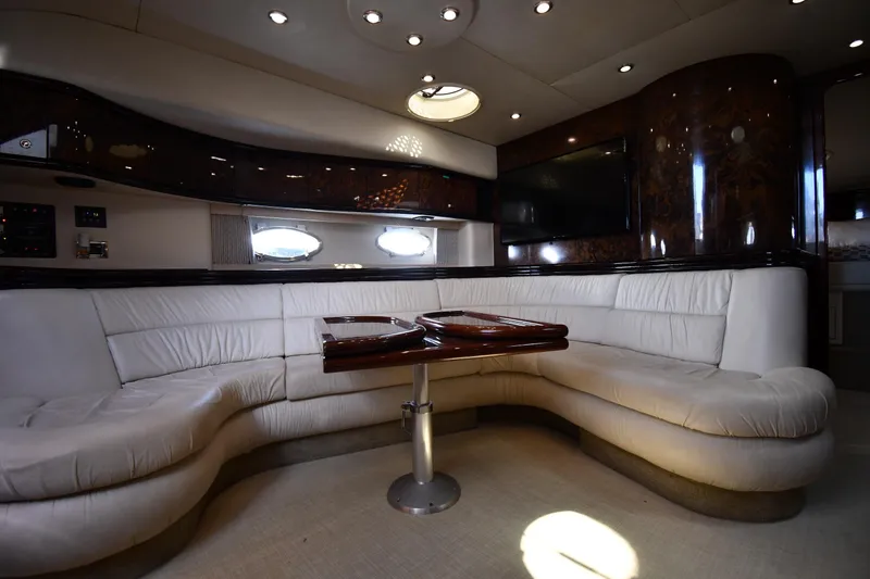 Slide: The Image of Luxurious interior of 1997 Sunseeker Camargue 51 yacht with plush seating and elegant design. - 36