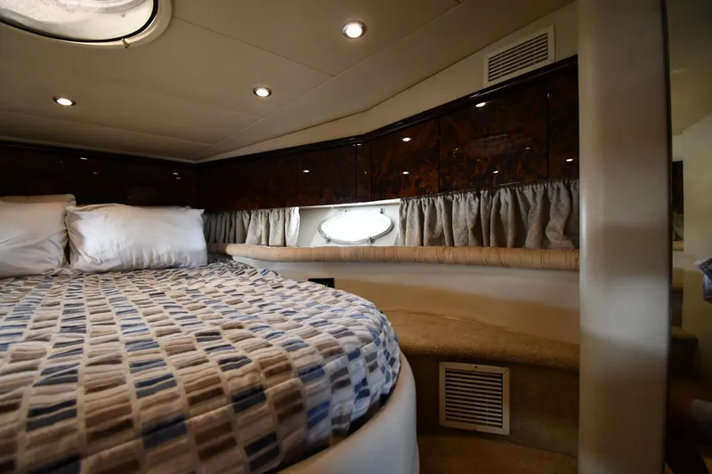 Slide: The Image of Luxurious cabin interior of 1997 Sunseeker Camargue 51 yacht with cozy bedding. - 29