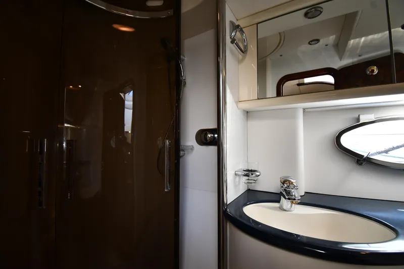 Slide: The Image of Bathroom interior of 1997 Sunseeker Camargue 51 yacht with sink and shower. - 41