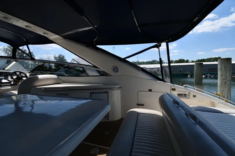 Slide: The Image of Interior view of 1997 Sunseeker Camargue 51 yacht, featuring seating and helm area. - 19