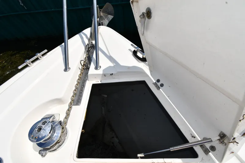 Slide: The Image of Anchor locker of 1997 Sunseeker Camargue 51 yacht with open hatch and chain. - 8