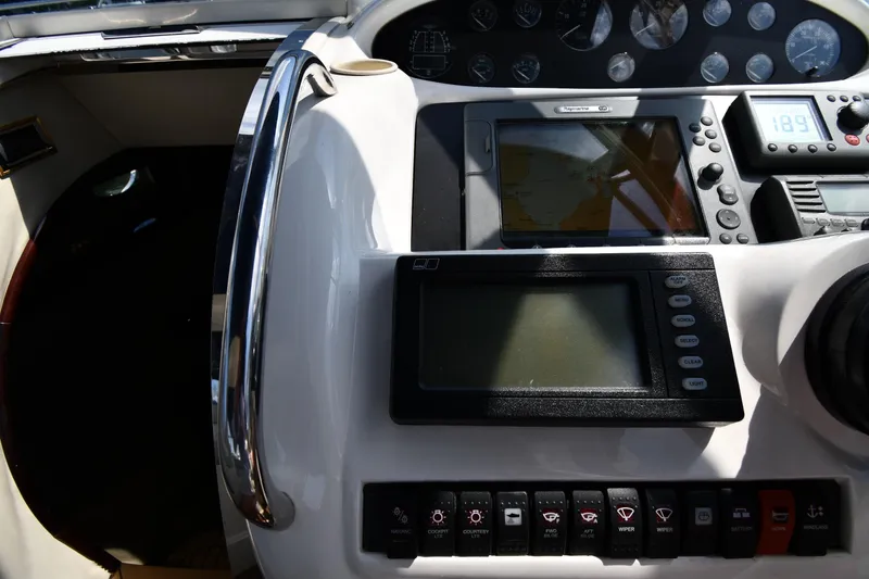 Slide: The Image of Control panel of a 1997 Sunseeker Camargue 51 yacht with navigation instruments. - 15