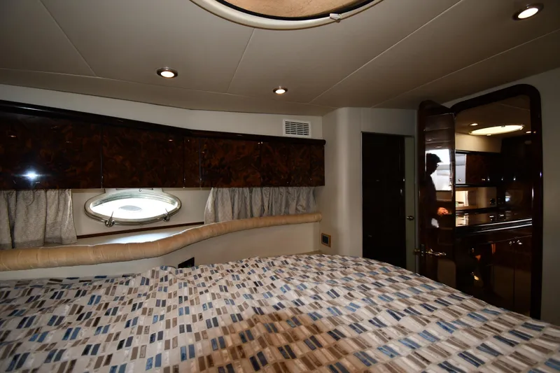 Slide: The Image of Luxurious interior of 1997 Sunseeker Camargue 51 yacht with elegant wood finishes. - 32