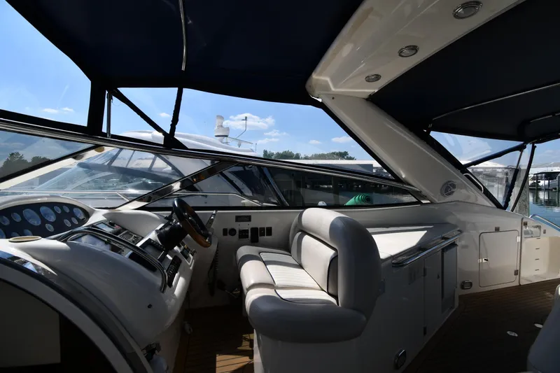 Slide: The Image of Interior view of 1997 Sunseeker Camargue 51 yacht cockpit with steering wheel and seating. - 18