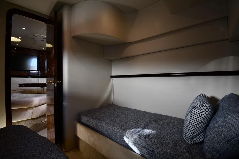 Slide: The Image of Interior cabin of 1997 Sunseeker Camargue 51 yacht with cozy seating and modern decor. - 47