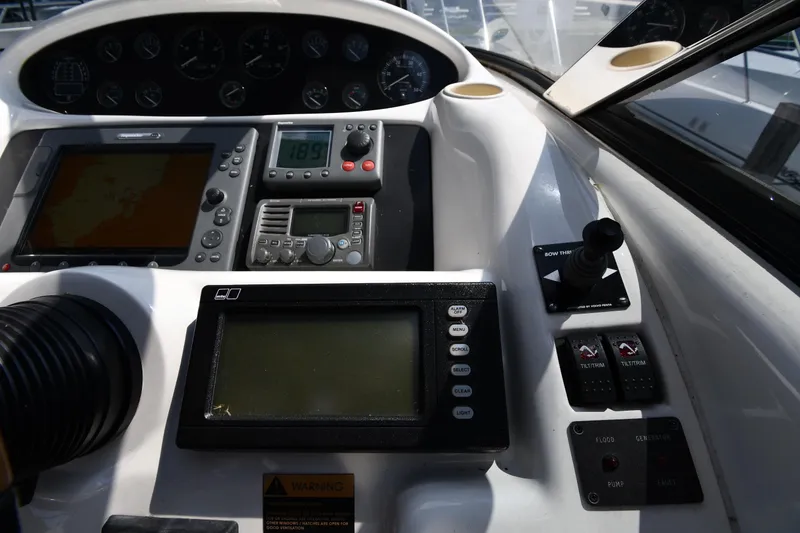 Slide: The Image of Control panel of a 1997 Sunseeker Camargue 51 yacht with navigation instruments. - 16
