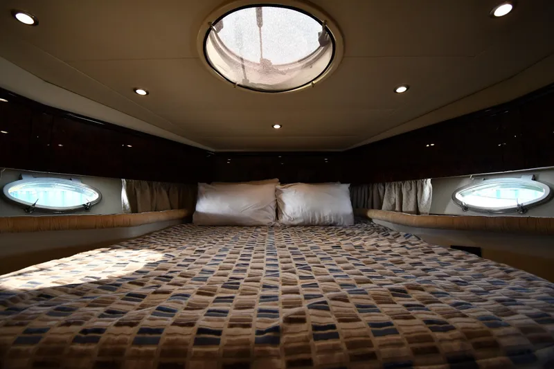 Slide: The Image of Interior cabin of 1997 Sunseeker Camargue 51 yacht with cozy bedding. - 28