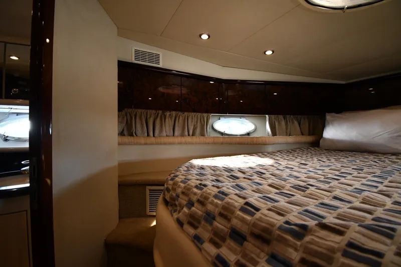 Slide: The Image of Luxurious cabin interior of 1997 Sunseeker Camargue 51 yacht with cozy bedding. - 30
