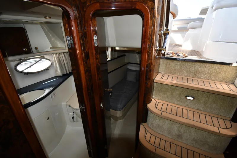 Slide: The Image of Interior of 1997 Sunseeker Camargue 51 yacht, featuring cabin and staircase. - 42
