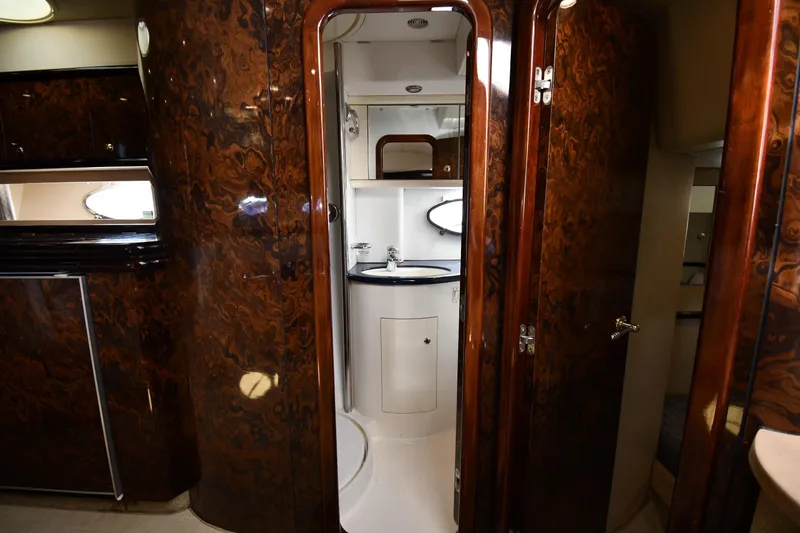 Slide: The Image of Luxurious interior of 1997 Sunseeker Camargue 51 yacht with elegant wood finish. - 39
