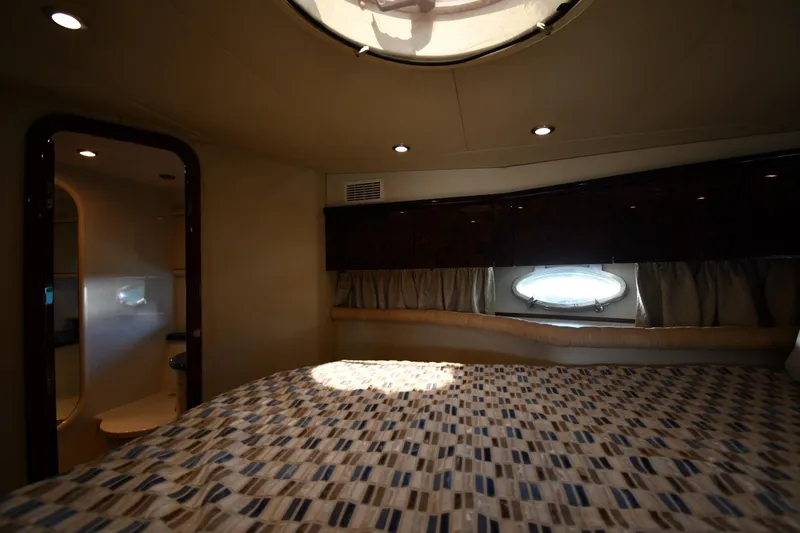 Slide: The Image of Luxurious cabin interior of 1997 Sunseeker Camargue 51 yacht with cozy bedding. - 31