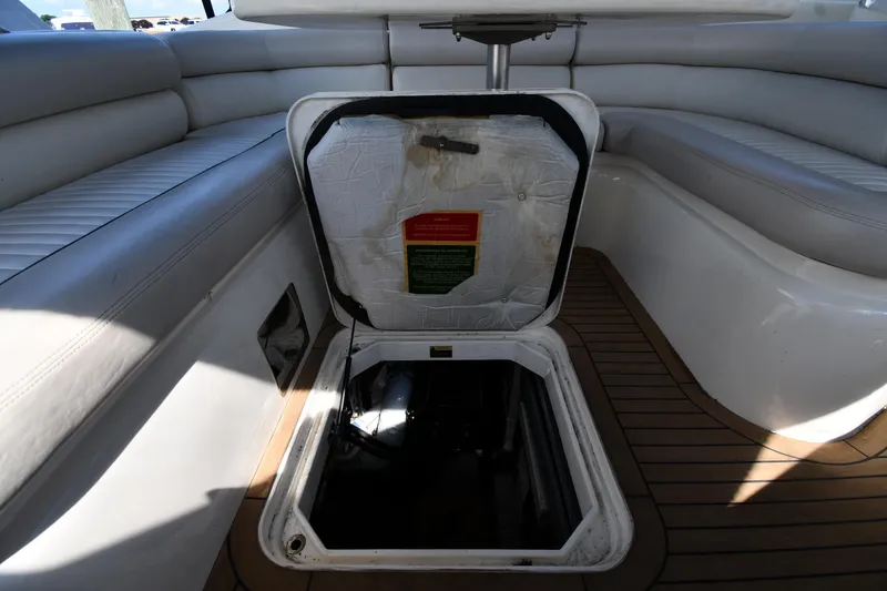 Slide: The Image of Open hatch on 1997 Sunseeker Camargue 51 yacht, revealing engine compartment. - 57
