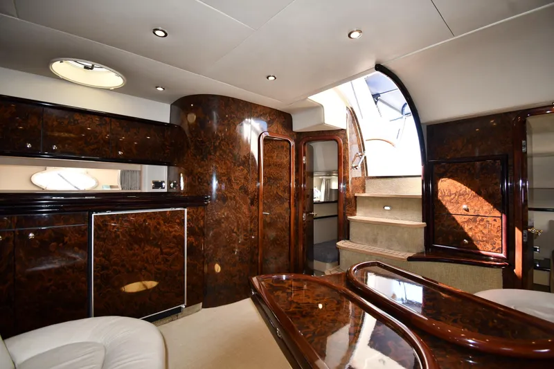 Slide: The Image of Luxurious interior of 1997 Sunseeker Camargue 51 yacht with polished wood finish. - 38