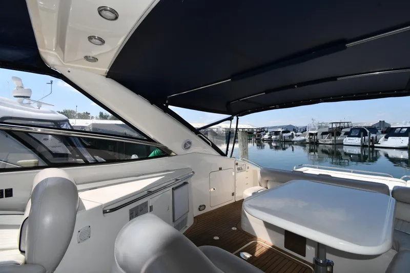 Slide: The Image of Interior view of 1997 Sunseeker Camargue 51 yacht with marina backdrop. - 22