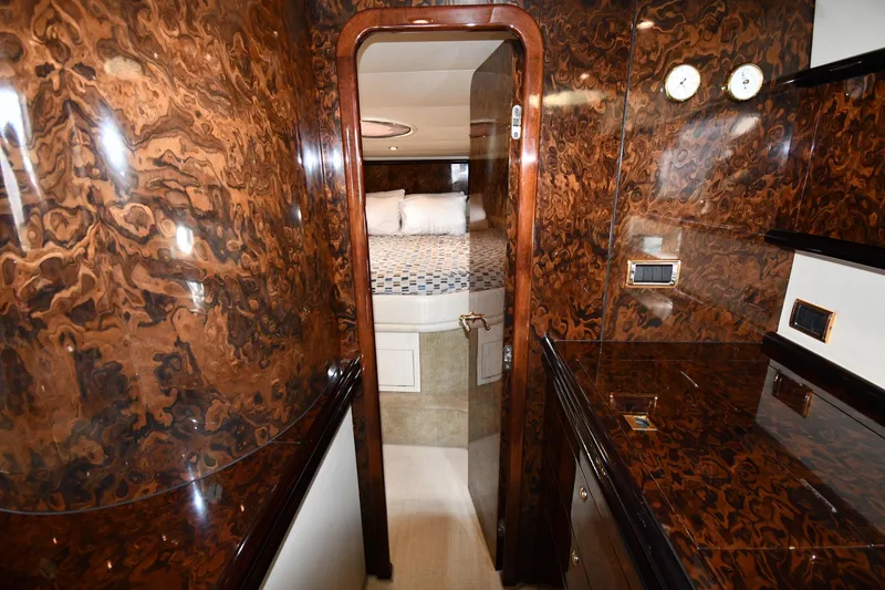 Slide: The Image of Luxurious interior of 1997 Sunseeker Camargue 51 yacht with polished wood finish. - 27