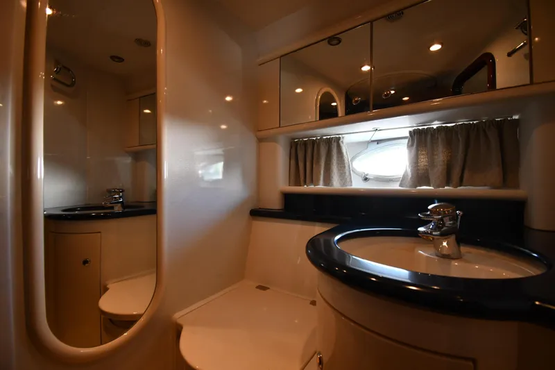 Slide: The Image of Luxurious bathroom interior of 1997 Sunseeker Camargue 51 yacht with modern fixtures. - 34