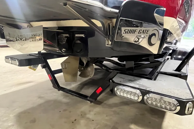 Slide: The Image of Rear view of a 2015 Malibu Wakesetter 24 MXZ with Surf Gate technology. - 10