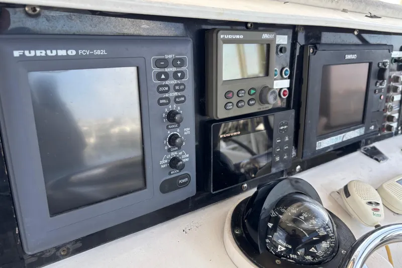 Slide: The Image of Control panel of a 1979 Trojan F-36 Convertible with navigation instruments. - 10