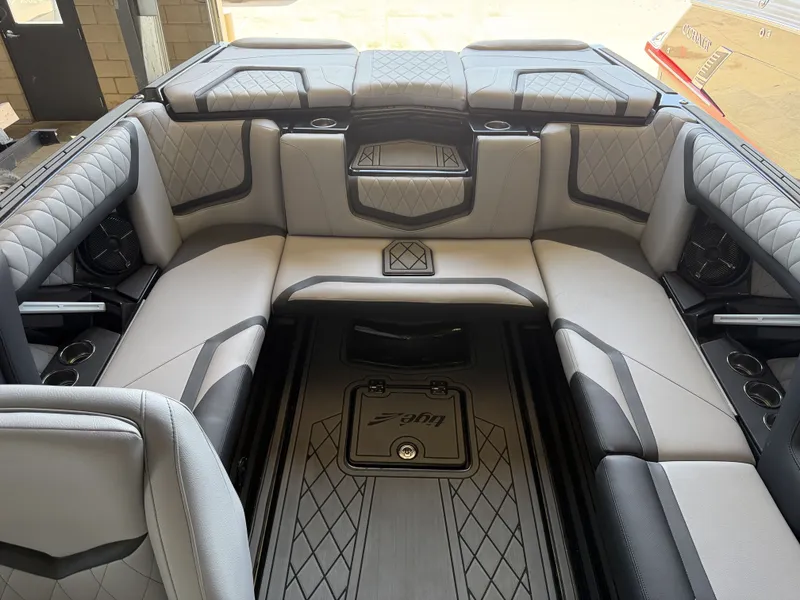 Slide: The Image of Interior of a 2021 Tigé 23ZX with luxurious padded seating and modern detailing. - 23