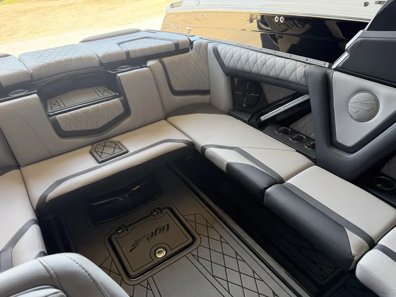 Slide: The Image of Interior of a 2021 Tigé 23ZX with gray upholstery and modern detailing. - 20