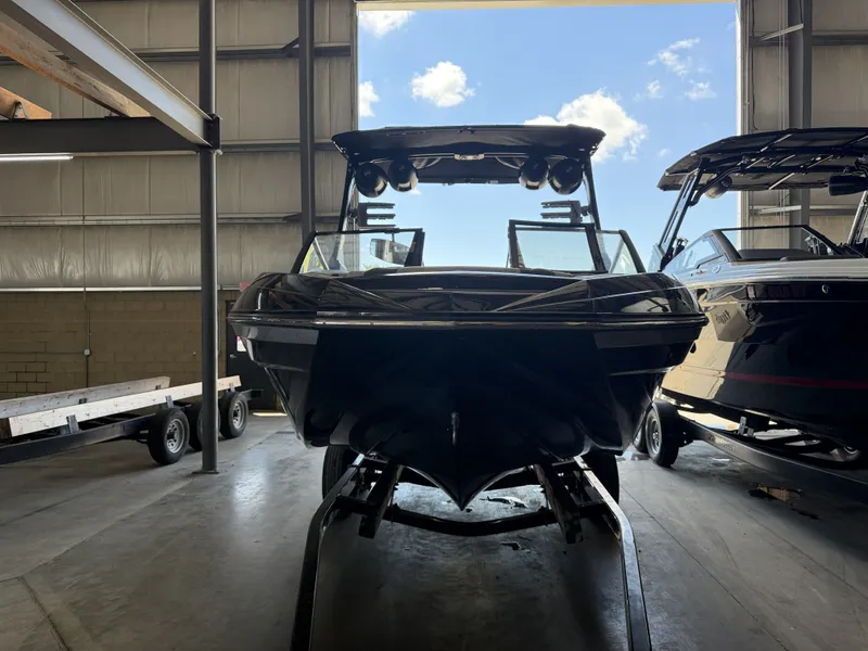 Slide: The Image of 2021 Tigé 23ZX in a storage facility, ready for adventure. - 3