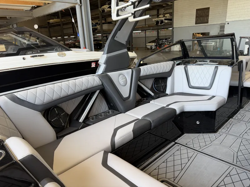Slide: The Image of Interior of a 2021 Tigé 23ZX with stylish upholstered seating and modern design elements. - 25
