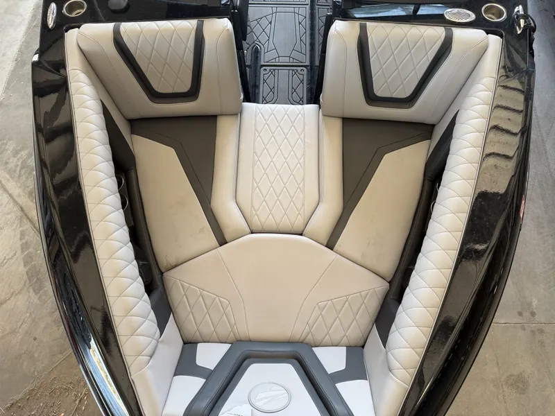 Slide: The Image of The 2021 Tigé 23ZX features a luxurious, cushioned seating area with a modern design. - 39