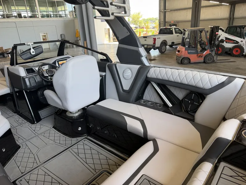 Slide: The Image of Interior view of a modern boat with stylish seating and a sleek helm station. - 26