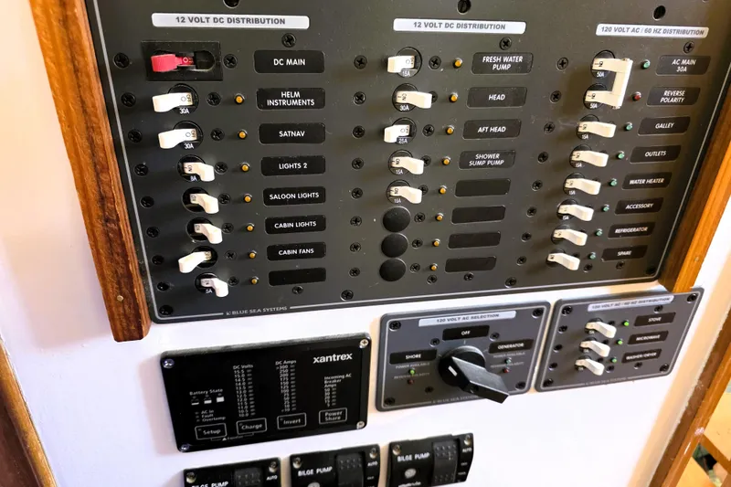 Slide: The Image of Electrical control panel on a 1978 Roughwater 41 twin cabin boat. - 13