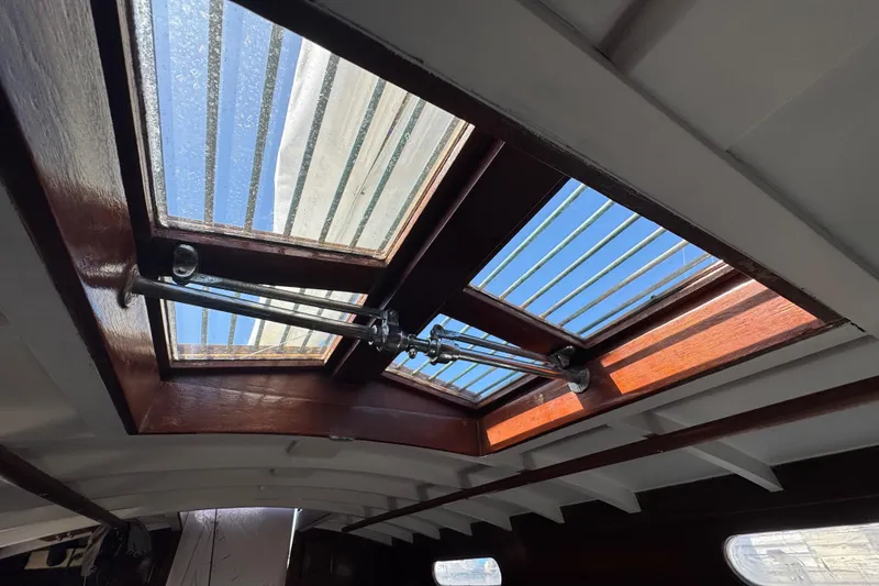 Slide: The Image of Interior view of 1955 Henry R Hinckley Owens Cutter skylight with wooden frame and metal bars. - 16