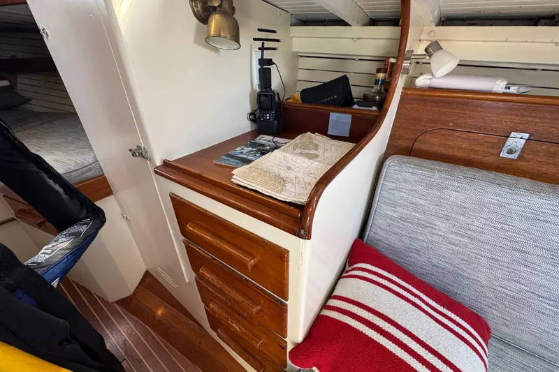 Slide: The Image of 1955 Henry R Hinckley Owens Cutter interior with navigation tools and cozy seating. - 10