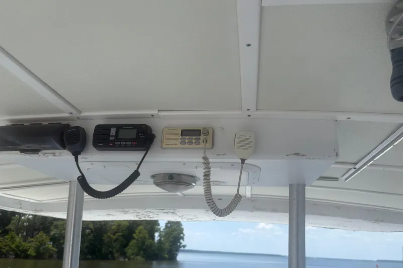Slide: The Image of Interior view of a 1973 Hatteras 53 Convertible boat with communication equipment. - 71