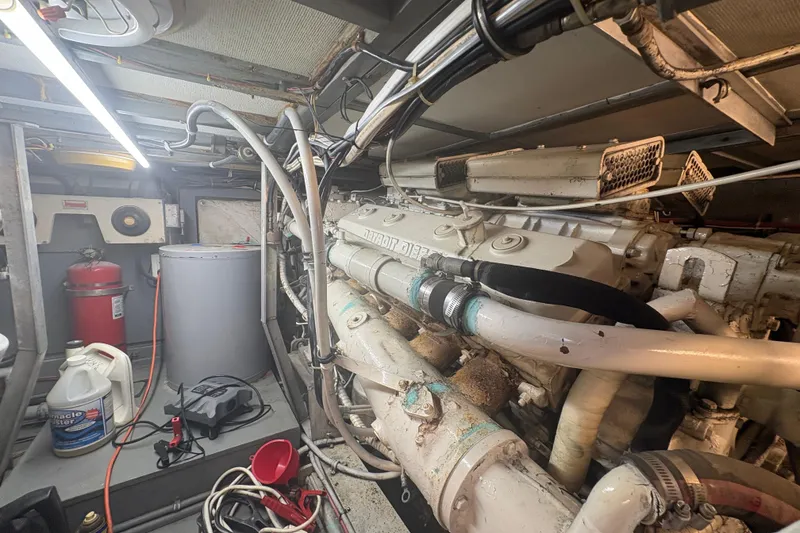 Slide: The Image of Engine room of a 1973 Hatteras 53 Convertible yacht, featuring Detroit Diesel engine. - 100
