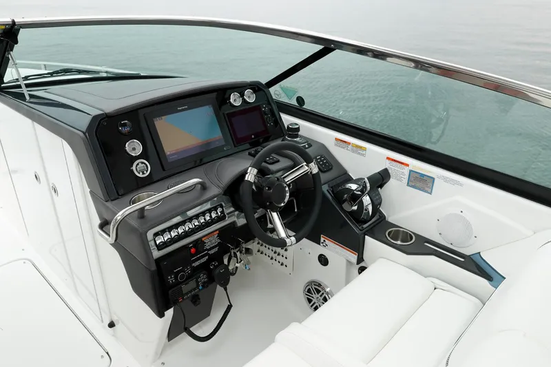 Slide: The Image of Manufacturer Provided Image: 2021 Formula 310 Bowrider OB helm with modern controls and navigation screens. - 9