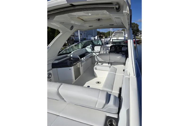 Slide: The Image of 2020 Formula 310 Bowrider OB interior with luxurious seating and modern amenities. - 18