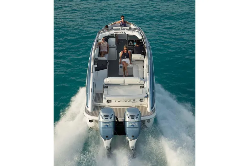 Slide: The Image of Manufacturer Provided Image: 2021 Formula 310 Bowrider OB cruising on the water with passengers. - 4