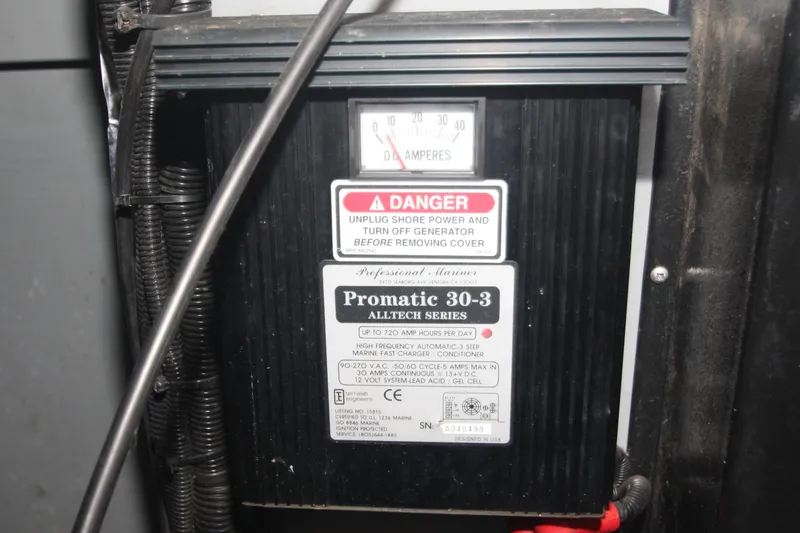 Slide: The Image of Marine battery charger on a 1999 Sea Ray 380 Sundancer, Promatic 30-3 model. - 73