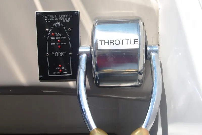 Slide: The Image of Throttle control and systems monitor on a 1999 Sea Ray 380 Sundancer boat. - 27