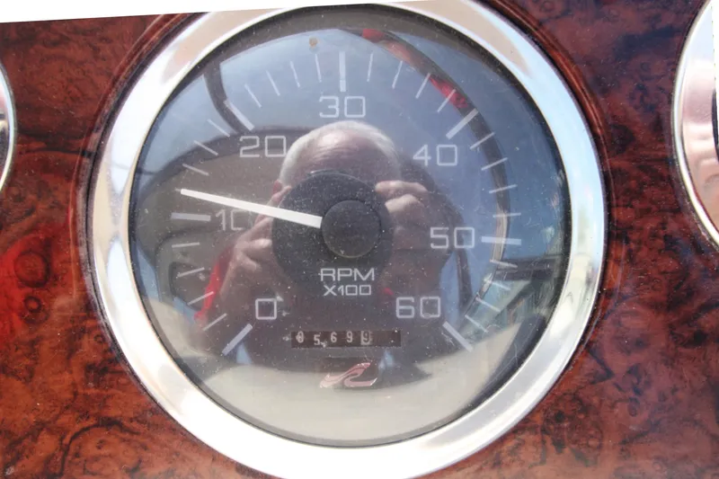 Slide: The Image of Close-up of 1999 Sea Ray 380 Sundancer RPM gauge, showing 10 RPM x100. - 29