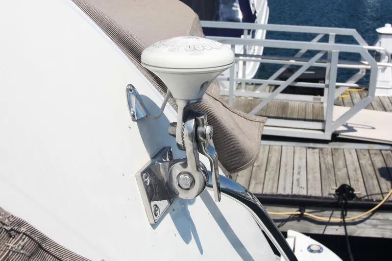 Slide: The Image of Close-up of a 1999 Sea Ray 380 Sundancer boat cleat on a sunny dock. - 41